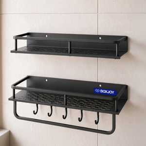 Grey BOXJOY wall-mounted bathroom shelfs with a lower towel bar and hooks installed on a tiled wall.