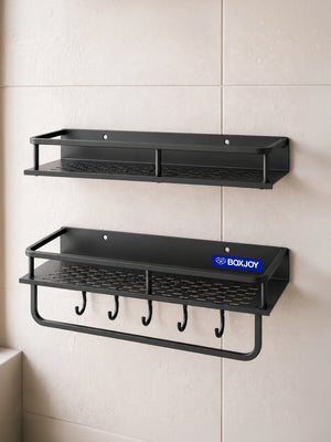 Grey BOXJOY wall-mounted bathroom shelfs with a lower towel bar and hooks installed on a tiled wall.