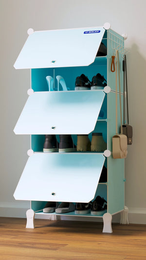 Light blue and white BOXJOY modular shoe wardrobe with 6 shelfs and opaque white doors, neatly storing various pairs of shoes.