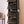 Black BOXJOY modular shoe wardrobe with 8 shelfs, smoky transparent doors, side bag hooks, and shoes stored inside.