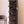 Tall black BOXJOY modular shoe wardrobe with 10 shelfs, transparent doors, and side bag hooks.