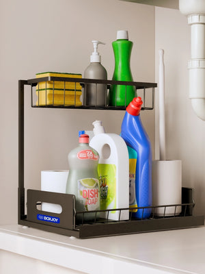 Black BOXJOY under-sink organizer with shelves holding cleaning supplies like dish soap and sponges