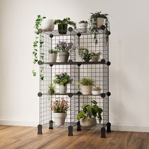 Fully organized BOXJOY 6-cube black metal wire plant stand rack filled with potted plants and indoor greenery.