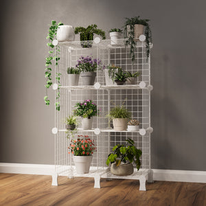 Fully organized BOXJOY 6-cube white metal wire plant stand rack filled with potted plants and indoor greenery.