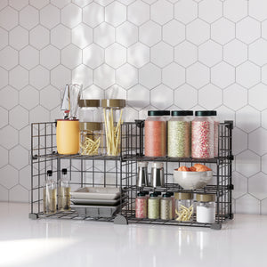 Fully organized BOXJOY 2-column black metal wire kitchen countertop rack filled with spice jars, oil bottles, and pasta containers.
