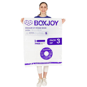 Woman holding a BOXJOY Pack of 3 Jumbo vacuum storage bag with free hand pump.