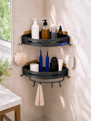 Grey BOXJOY corner shelfs holding bathroom toiletries, toothbrushes, and a hanging towel.