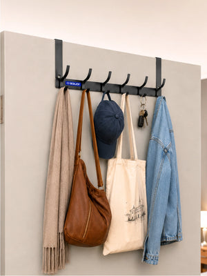 Grey BOXJOY over-the-door hook hanger holding a scarf, bags, a hat, keys, and a denim jacket.