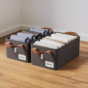 BOXJOY set of 2 dark grey fabric wardrobe organizer baskets filled with folded jeans and shirts.