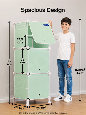 Spacious design of the BOXJOY Plastic 6 Shelf Green Kids Wardrobe next to a 112 cm tall boy.