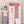 Spacious design of the 7 modular shelfs showing a 129 cm total height next to a 112 cm tall smiling girl.