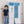 Spacious design of the 7 modular shelfs showing a 129 cm total height next to a 112 cm tall smiling boy.