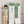 Spacious design of the 7 modular shelfs showing a 129 cm total height next to a 112 cm tall smiling boy.