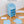 Durable material of the blue wardrobe with 6 shelfs showing a sturdy metal frame and plastic doors.