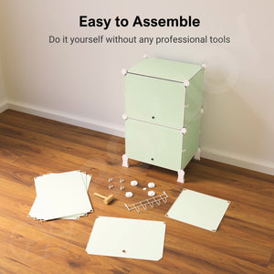 Easy to assemble green BOXJOY modular wardrobe with 6 shelfs, shown partially built alongside unboxed panels, connectors, and a mallet.