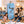 Smiling family watching a boy point at astronaut stickers on his BOXJOY Plastic 6 Shelf Blue Kids Wardrobe.