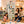 Smiling family watching a boy point at jungle stickers on his BOXJOY Plastic 6 Shelf Green Kids Wardrobe.