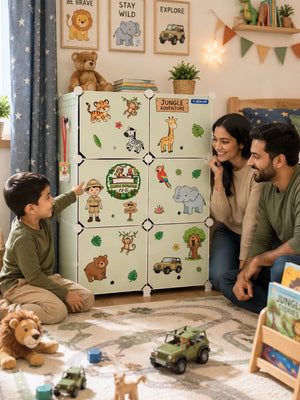 Smiling family watching a boy point at jungle stickers on his BOXJOY Plastic 12 Shelf Green Kids Wardrobe.