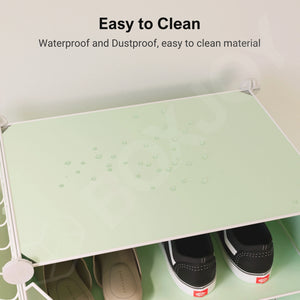 Water droplets on the green material of the BOXJOY 6 tier shelfs, demonstrating the easy to clean, waterproof, and dustproof design.